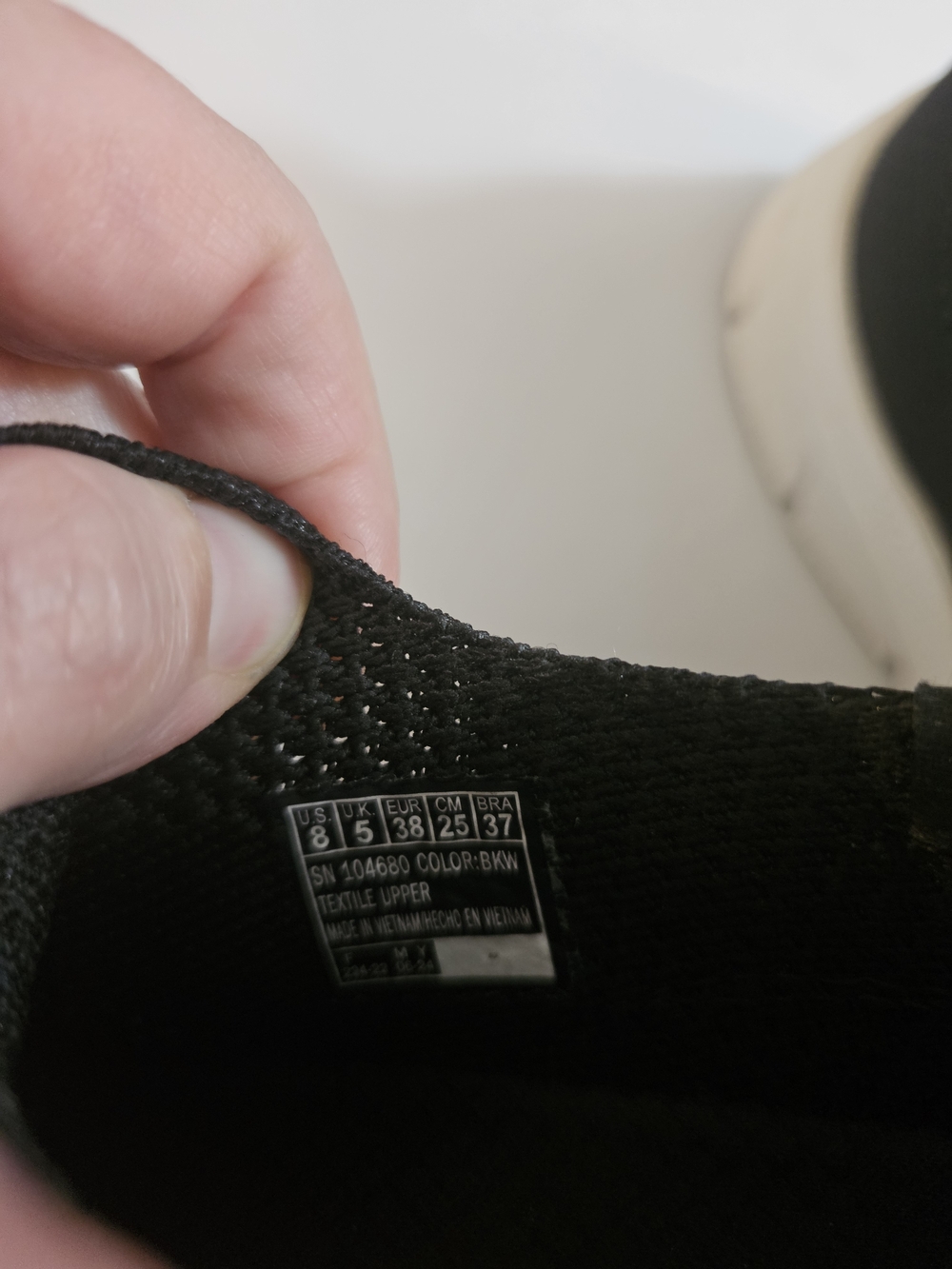 Skechers Black Slip-On Knit Sneakers with White Sole - Picture 6 of 10